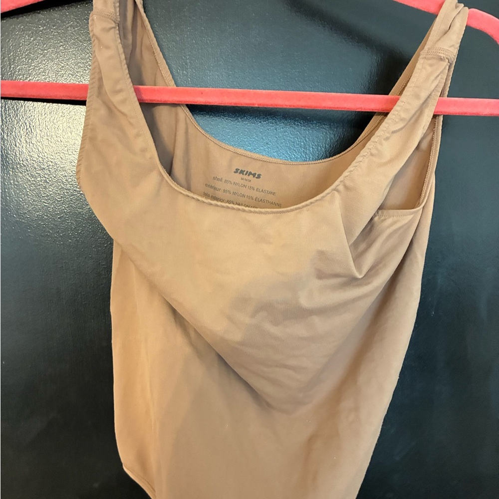 Skims body suit. Worn once. Like new